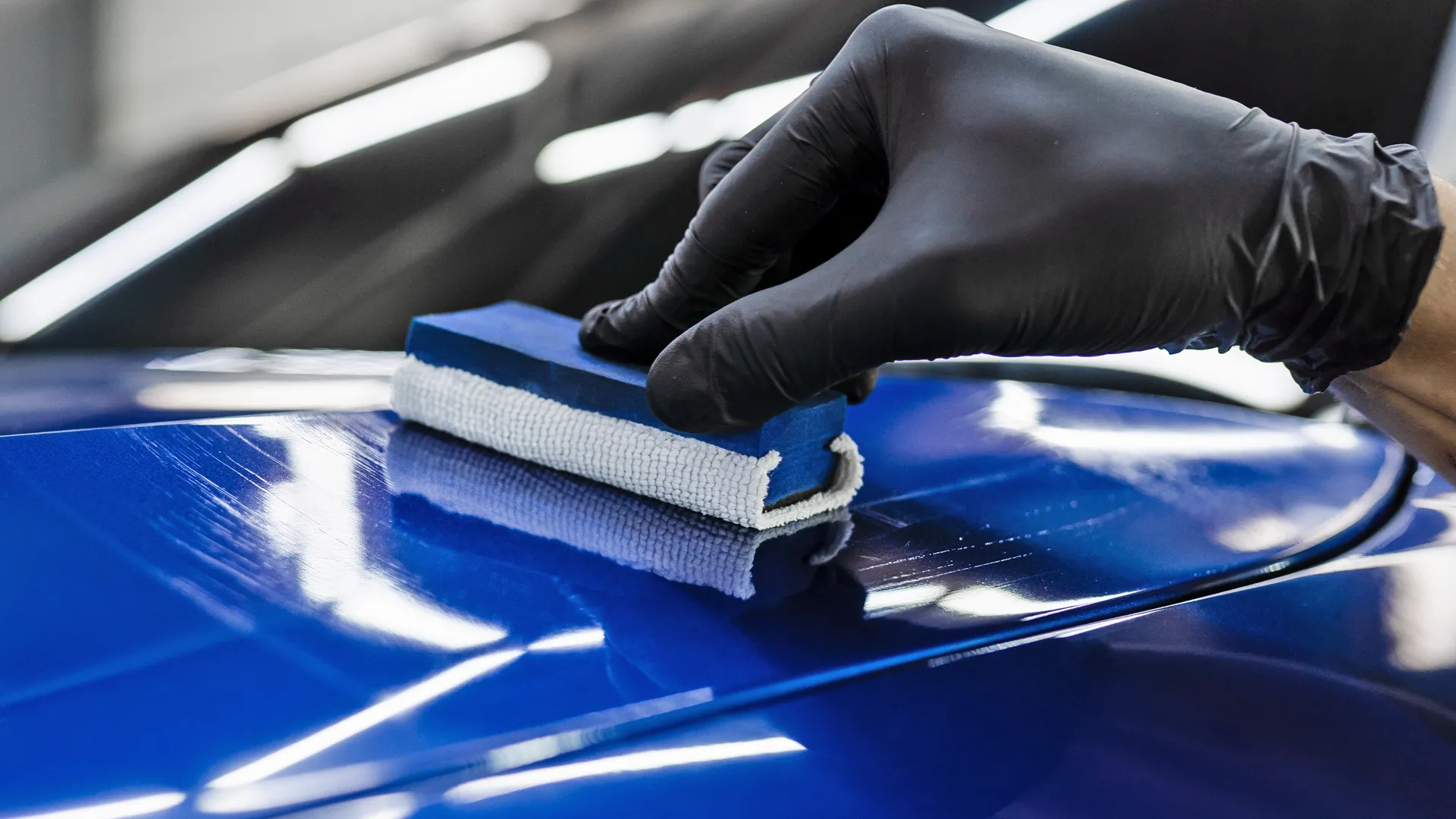Car with ceramic coating reflecting sunlight
