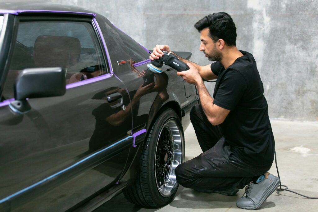 Polishing your car for a glossy finish with Menzerna and Rupes products.